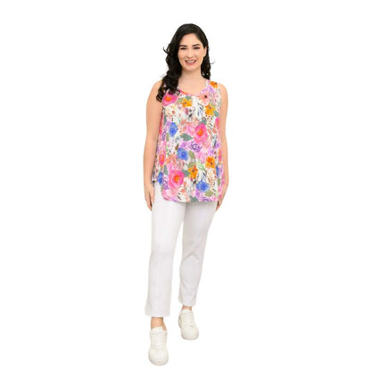 female model wearing pink bouquet print jazz tank top and white nadine cropped pants front view on white background