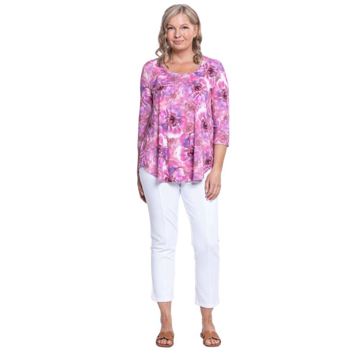 female model wearing jazz royale cardiff print three quarter sleeve top and white nadine cropped pants front view on white background