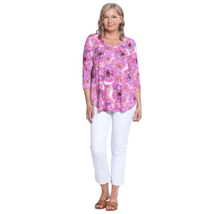 female model wearing jazz royale cardiff print three quarter sleeve top and white nadine cropped pants front view on white background