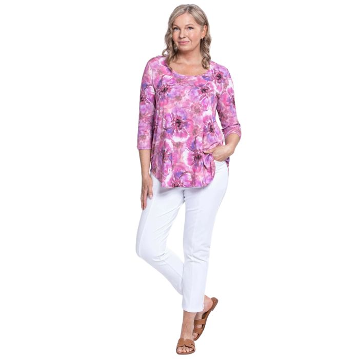female model wearing jazz royale cardiff print three quarter sleeve top and white nadine cropped pants front view on white background