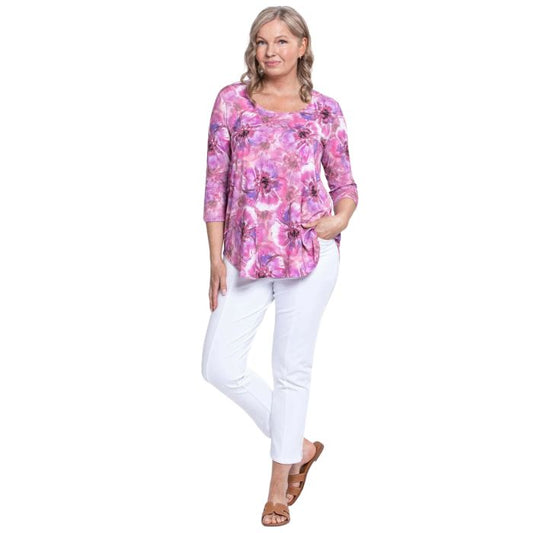 female model wearing jazz royale cardiff print three quarter sleeve top and white nadine cropped pants front view on white background