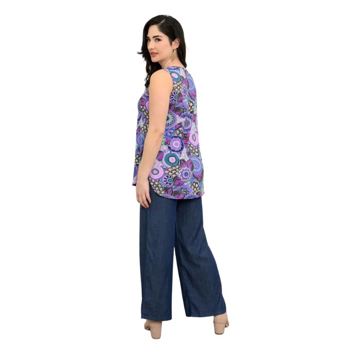 female model wearing royale peacock print jazz tank top and denim blue jeans back view on white background