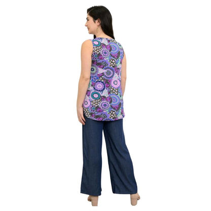 female model wearing royale peacock print jazz tank top and denim blue jeans back view on white background