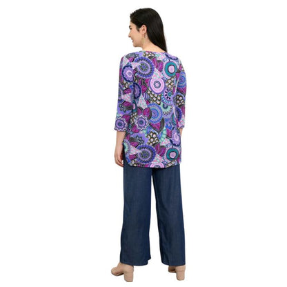 female model wearing jazz royale peacock print three quarter sleeve top and denim blue parker pants back view on white background