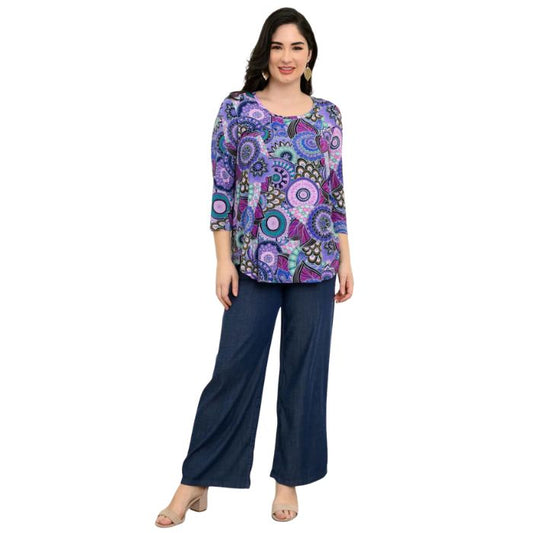 female model wearing jazz royale peacock print three quarter sleeve top and denim blue parker pants front view on white background