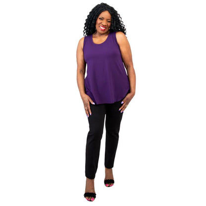 female model wearing royale purple jazz tank top and black nadia pants front view on white background