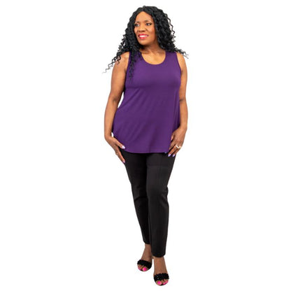 female model wearing royale purple jazz tank top and black nadia pants front view on white background