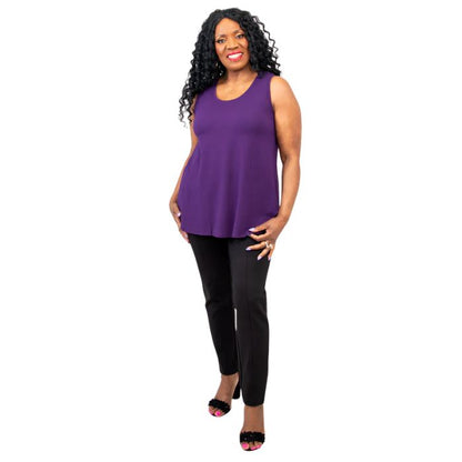 female model wearing royale purple jazz tank top and black nadia pants front view on white background