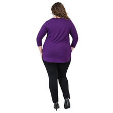 female model wearing jazz royal purple three quarter sleeve top and nadia black pants back view on white background