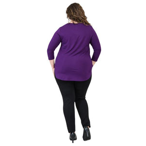 female model wearing jazz royal purple three quarter sleeve top and nadia black pants back view on white background