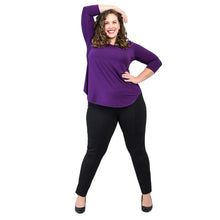 female model wearing jazz royal purple three quarter sleeve top and nadia black pants front  view on white background