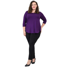 female model wearing jazz royal purple three quarter sleeve top and nadia black pants front  view on white background