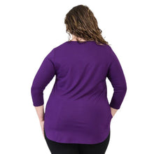 top half of female model wearing jazz royal purple three quarter sleeve top back view on white background