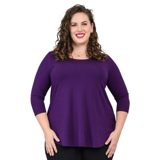 top half of female model wearing jazz royal purple three quarter sleeve top front view on white background