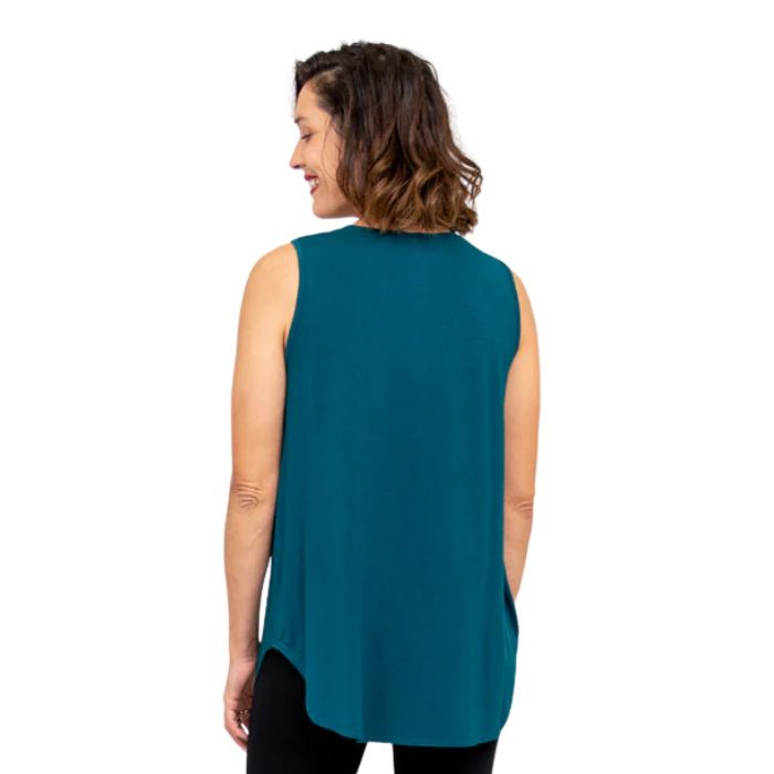 female model wearing teal green jazz tank top back view on white background