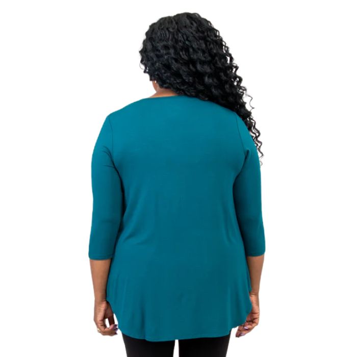 top half of female model wearing jazz teal green three quarter sleeve top back view on white background