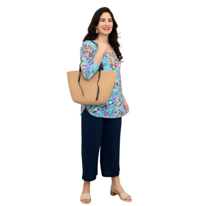 female model wearing jazz teal nectar print three quarter sleeve top and indigo blue landon capri pants front view on white background