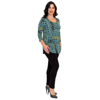 female model wearing jazz teal ways print three quarter sleeve top and black nadia pants side view on white background