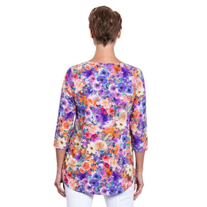 female model wearing jazz violet fiesta print three quarter sleeve top back view on white background