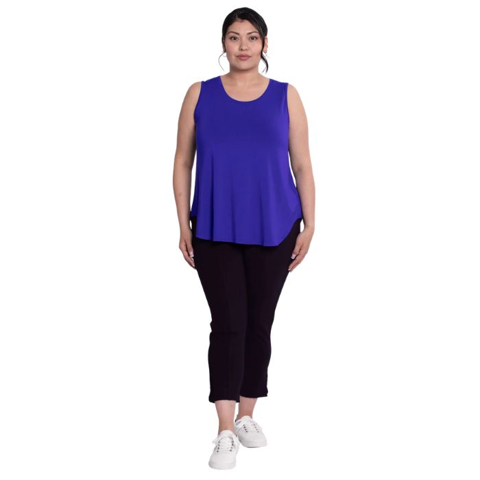 female model wearing violet purple jazz tank top and black susan cropped pants front view on white background
