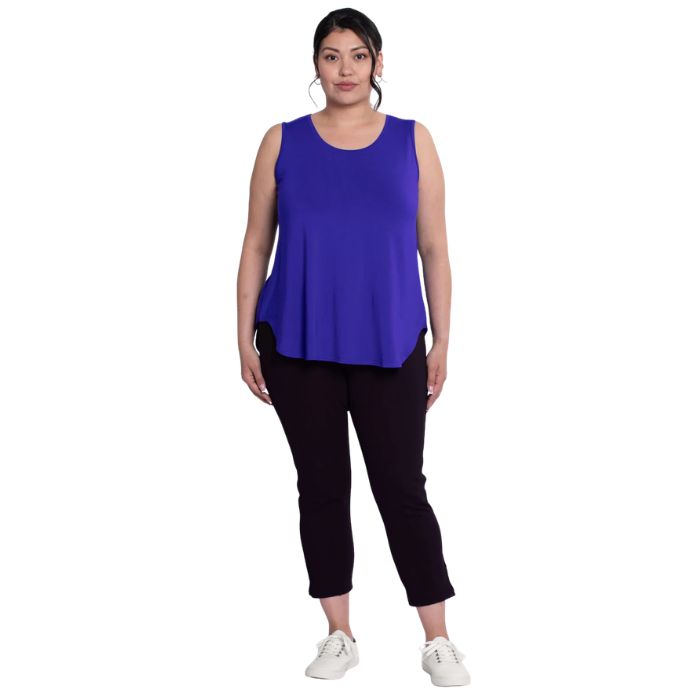 female model wearing violet purple jazz tank top and black susan cropped pants front view on white background