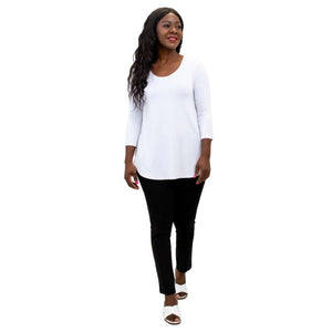 female model wearing jazz white three quarter sleeve top and nadia black pants front view on white background