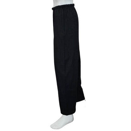 mannequin wearing black jeff pants side view on white background