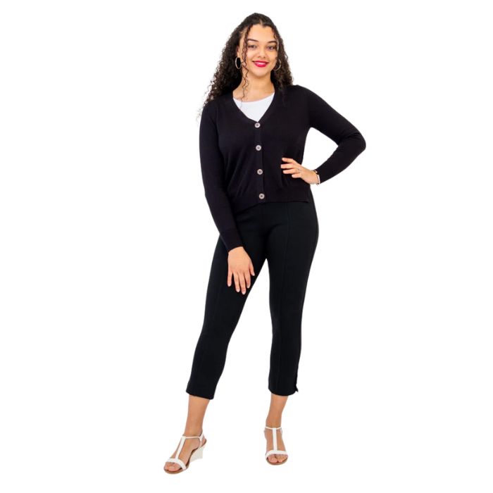 female model wearing black jessica button up cardigan sweater white reanna tank top and black nadine cropped pants front view on white background