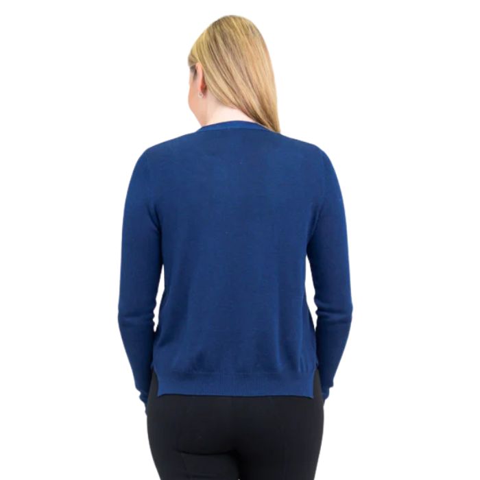 top of female model wearing jessica indigo blue button up cardigan sweater back view on white background