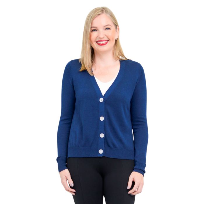 top of female model wearing jessica indigo blue button up cardigan sweater front view on white background