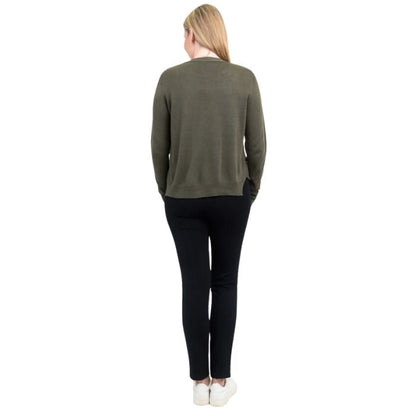 female model wearing khaki green jessica button up cardigan sweater, white reanna tank top and black nadia pants back view on white background