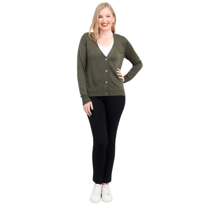 female model wearing khaki green jessica button up cardigan sweater, white reanna tank top and black nadia pants front view on white background