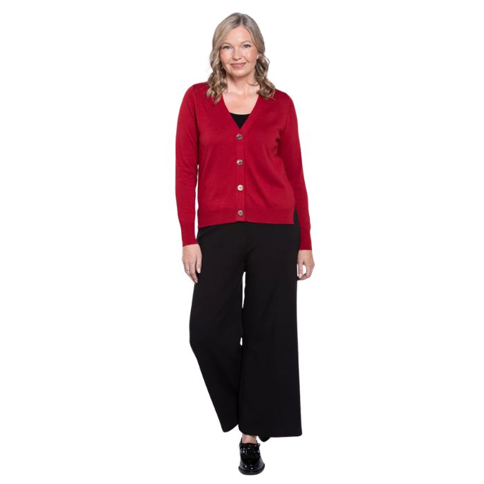 female model wearing lipstick red jessica button up cardigan sweater, black reanna tank top and black landon capri pants front view on white background