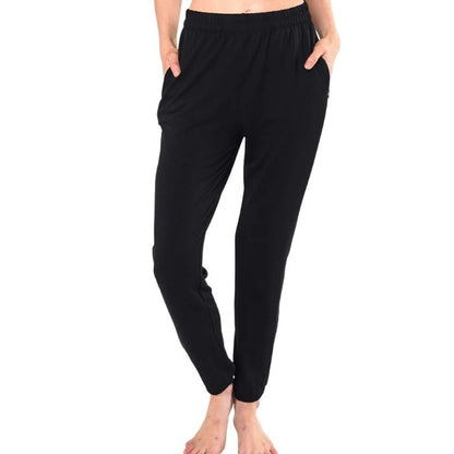 female model wearing black julie zippered joggers front view on white background