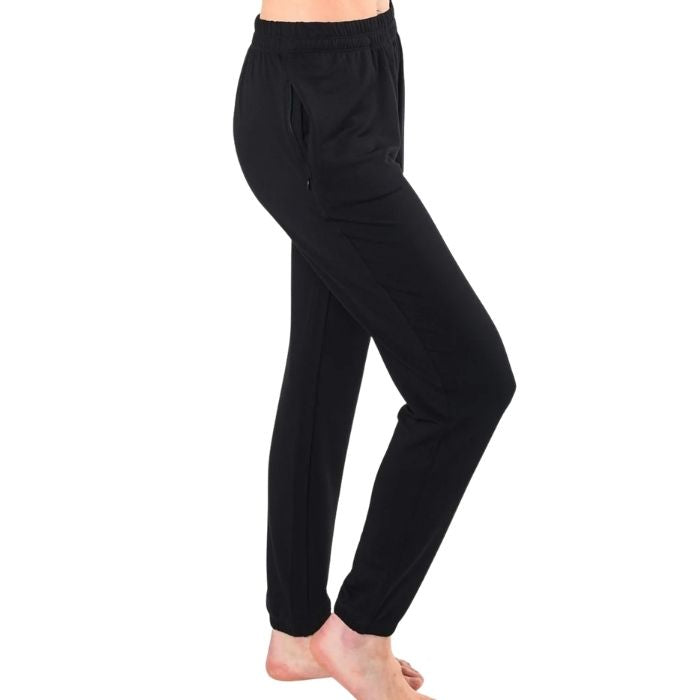 female model wearing black julie zippered joggers side view on white background