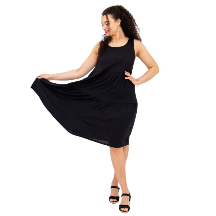 female model wearing black juni dress front veiw on white background