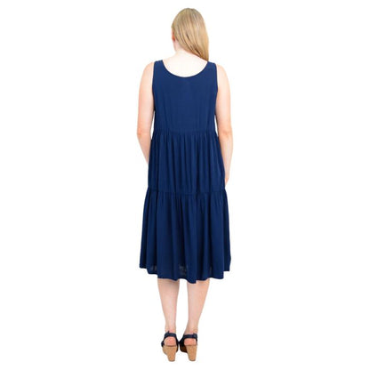 female model wearing indigo blue juni dress front veiw on white background