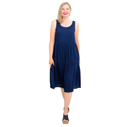 female model wearing indigo blue juni dress front veiw on white background