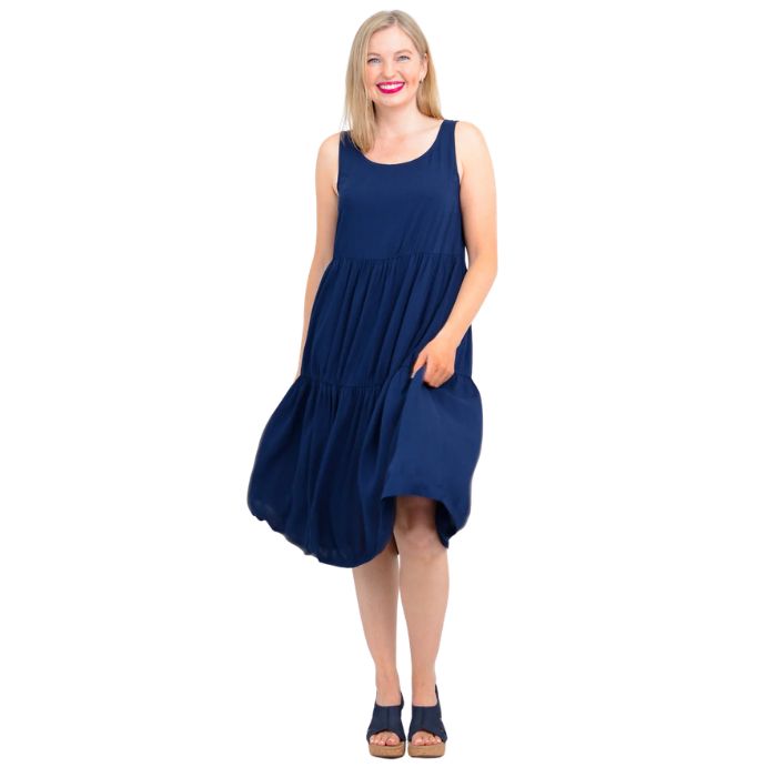 female model wearing indigo blue juni dress front veiw on white background