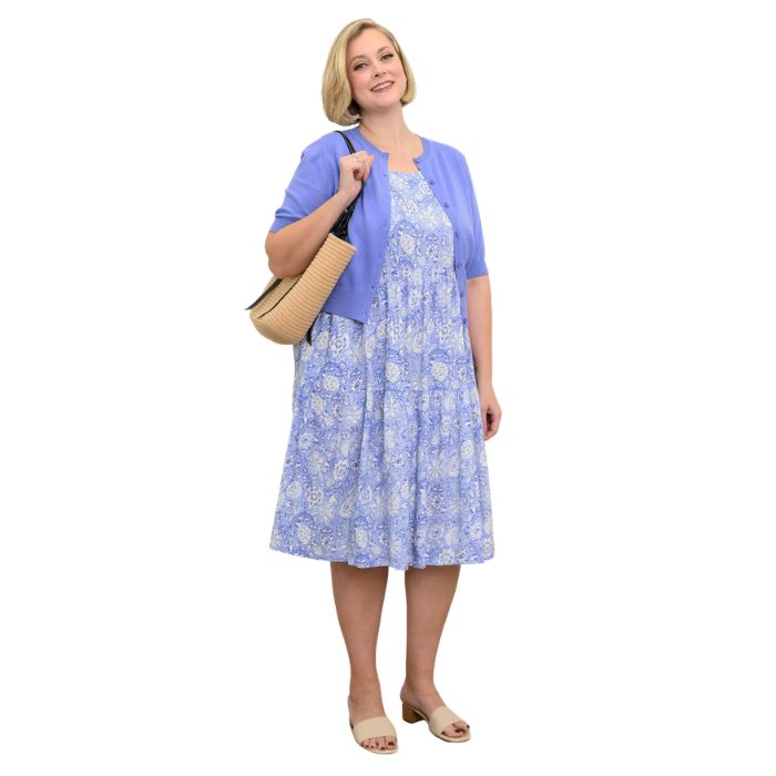 female model wearing peri teatime print  juni dress and blue isabella cardigan front veiw on white background