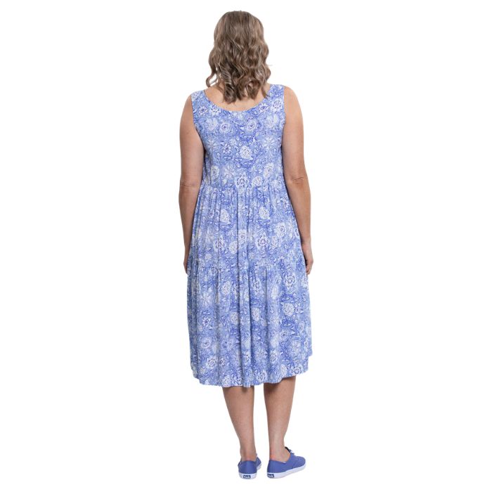 female model wearing peri teatime print  juni dress back veiw on white background
