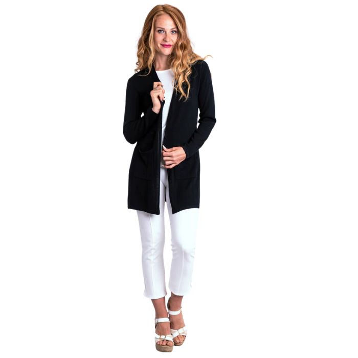 female model wearing black justine draped cardigan sweater, white reanna tank top and white nadine croppped pants front view on white background