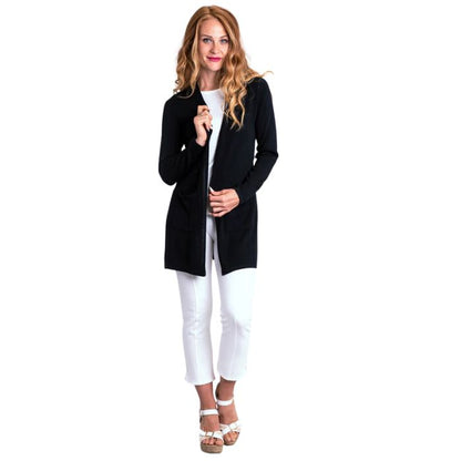 female model wearing black justine draped cardigan sweater, white reanna tank top and white nadine croppped pants front view on white background