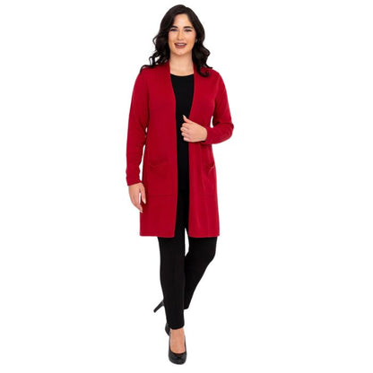 female model wearing justine lipstick red draped cardigan sweater, reanna black tank top and nadia black pants front view on white background