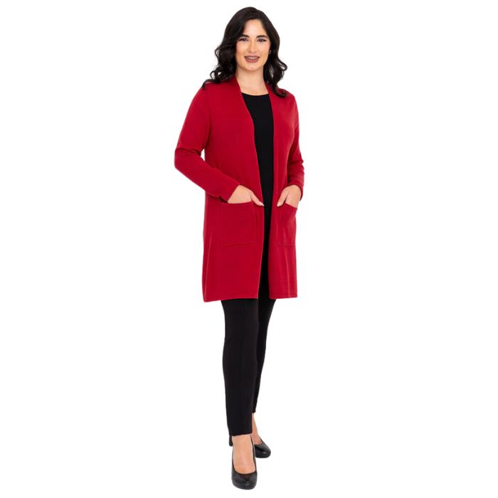 female model wearing justine lipstick red draped cardigan sweater, reanna black tank top and nadia black pants front view on white background