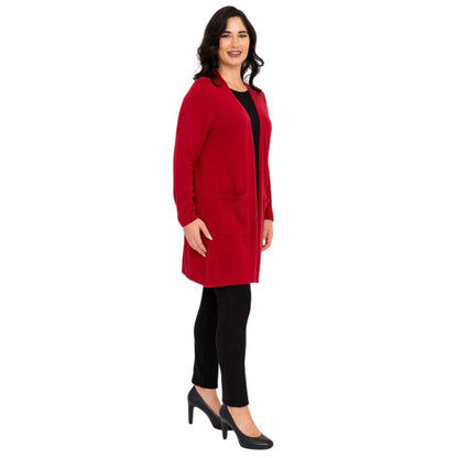 female model wearing lipstick red justine draped cardigan sweater, black reanna tank top and black nadia pants side view on white background