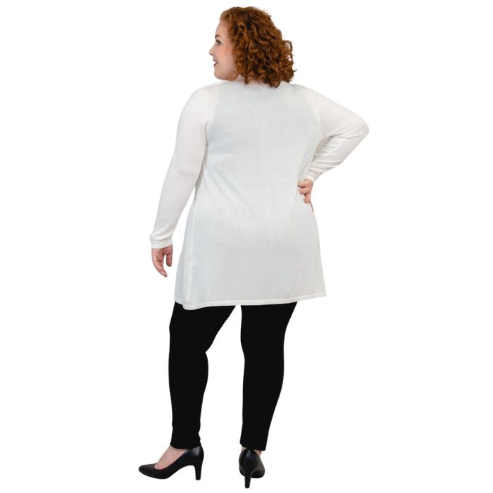 female model wearing justine white draped cardigan sweater over reanna white tank top and nadia black pants  back view on white background