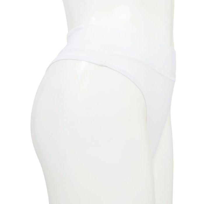 body of white female mannequin wearing snow white la thong underwear side view on white background