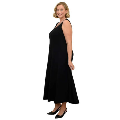 woman wearing black lanai dress side view set on a white background