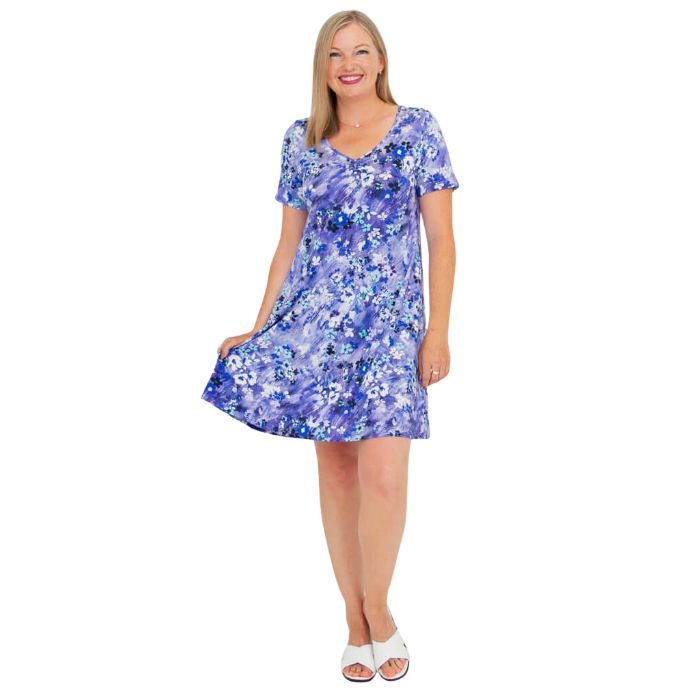 woman wearing creative print lanai dress front view set on a white background